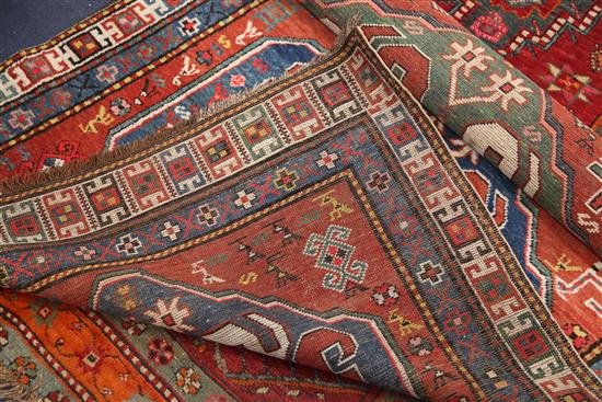 A Kazak red ground rug, c.1885, 7ft 6in by 3ft 11in.